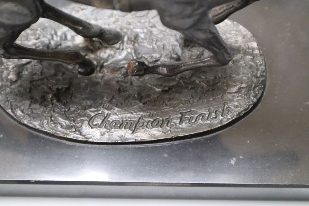 David Cornell, 1985. A cast bronze racehorse and jockey, entitled Champion Finish, on slate plinth, height 20cm